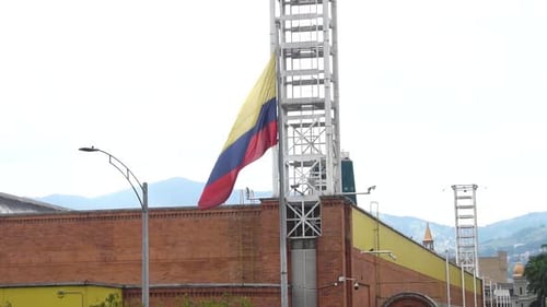 Patriots raise the Colombian flag to celebrate Independence Day