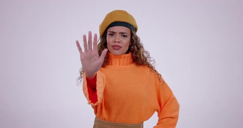 Face, hand or woman with stop, warning or rejection with girl on a white studio background