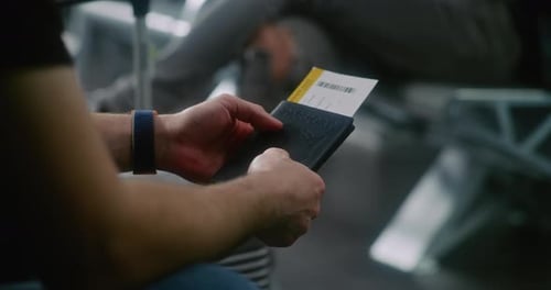 Airport Terminal Close Up of Man with Suitcase Waiting for Flight in Boarding Lounge of Airline Hub