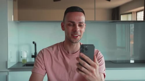 Freelancer Businessman Having Video Call on Smartphone at Home Close Up Caucasian Guy Sitting at