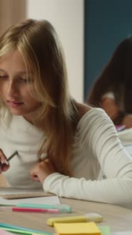 Unhappy Caucasian Little Girl Child Showing Thumb Down Studying Inside Classroom Dislike Gesture Kid