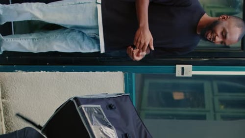 Vertical Video Confused Courier Delivering Wrong Fastfood Order to Client