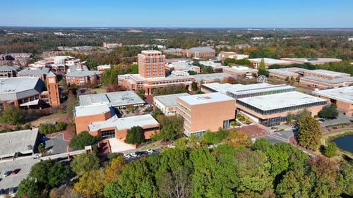 UNC Charlotte college campus. Aerial view of University of North Carolina buildings from drone.