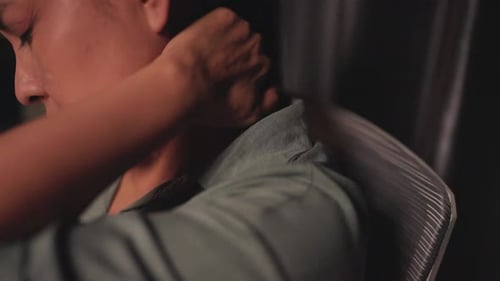 Close up - Women have office syndrome Stress from work, holding her neck in bad position