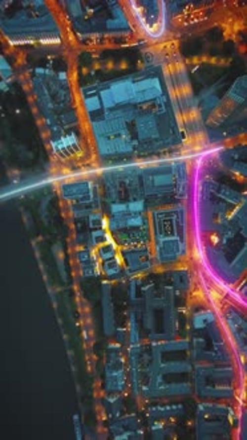 Top Down Hyper Lapse Footage of Traffic in Urban Borough at Night Visual Effect Highlighting Traces