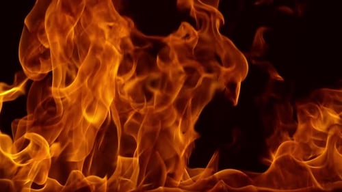 Abstract Flames Dancing Against Black Background