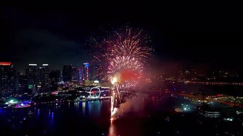 Aerial View Dazzling Fireworks Display over City at Night