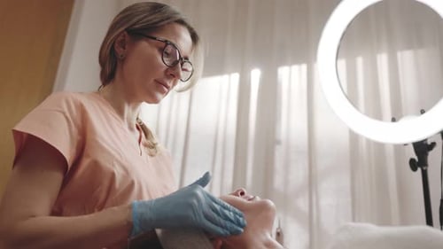 Facial Massage by Beautician in Workplace