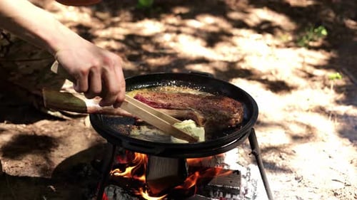 Cooking Ribeye Steak Over Campfire