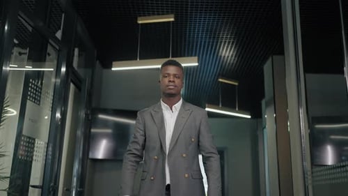 Portrait of Confident Black Businessman or Manager in Modern Office Look at Camera Business Suit