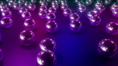 Metallic spheres create a modern, elegant background with vibrant colors