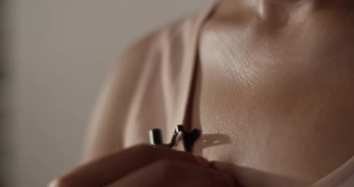 Anonymous Vlogger Preparing Microphone for Stream