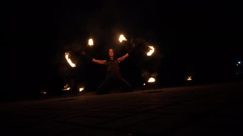 Fire Dancer Performance at Night