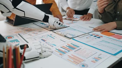 A modern office where AI-powered technology helps business teams analyze trends