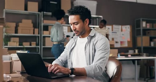 Supply chain, laptop and man in office for shipping, delivery orders and online inventory