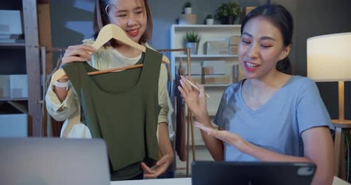 fashion designer look at camera online live stream show new collection product receive purchase.