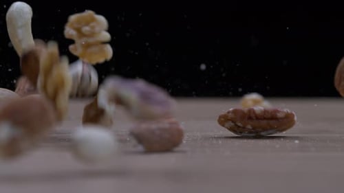 Mixed Nuts Falling in Slow Motion – Almonds, Walnuts, Pecans, Cashews, Hazelnuts, and Pistachios
