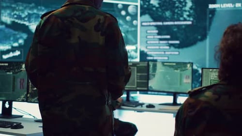 General of the Army Overseeing Special Reconnaissance Mission in Control Center