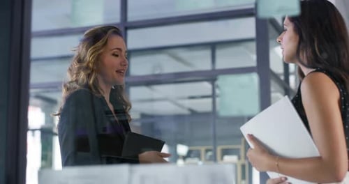 Women Meeting and Shaking Hands in Office