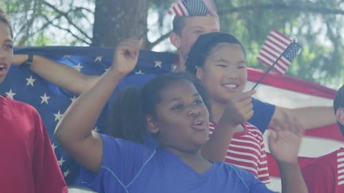 Enthusiastic Children Wave American Flags Celebrating