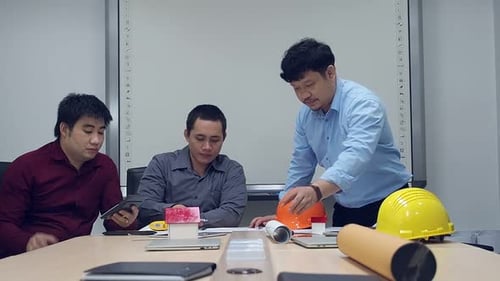 Confident team of architect working together in a office.