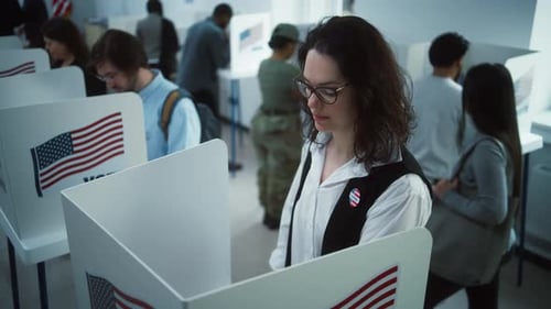 National Election Day in United States Woman Votes in Booth