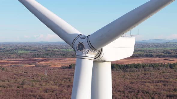 Closeup Of Wind Turbine Rotor And Blades On A Sunny Day. - aerial shot ...