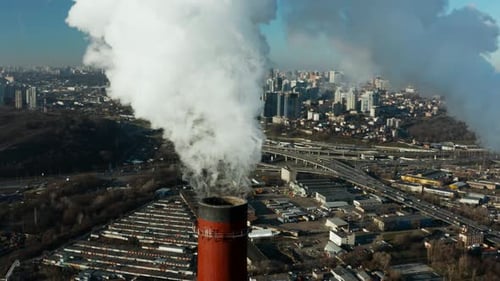 Pollution of the environment: a pipe with smoke. Power Plant.