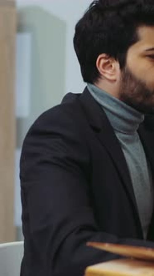 Young Man Working in an Office