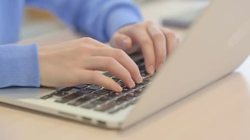Close up of Woman Typing on Laptop