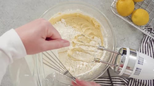 Flat Lay Ingredients in a Glass Mixing Bowls to Bake a Lemon Pound Cake