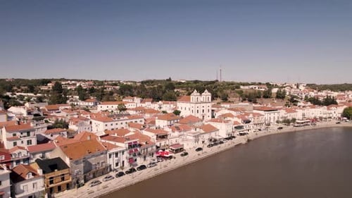 Alcaçer do Sal promenade by Sado river, Alentejo, Portugal. Beautiful cityscape. Aerial view