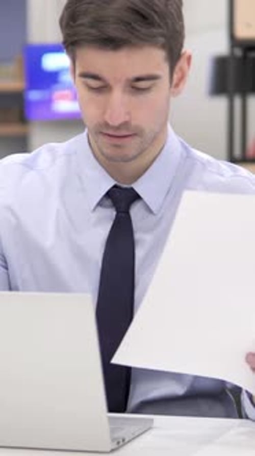 Business Paperwork in Office by Businessman. vertical video