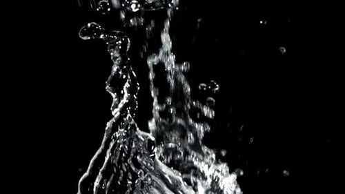 Water Splashing Upwards in Slow Motion on Black