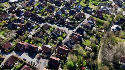 American city neighborhood during sunny day in spring. Drone flight over peaceful and calm housing a
