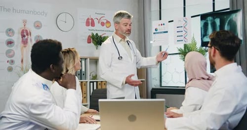 Medical Professionals Meeting and Presentation in Bright Office
