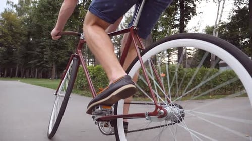 Unrecognizable Young Man Riding a Vintage Bicycle Sporty Guy Cycling at the Park Healthy Active