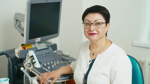 Medical Professional at Ultrasound Machine in Clinic
