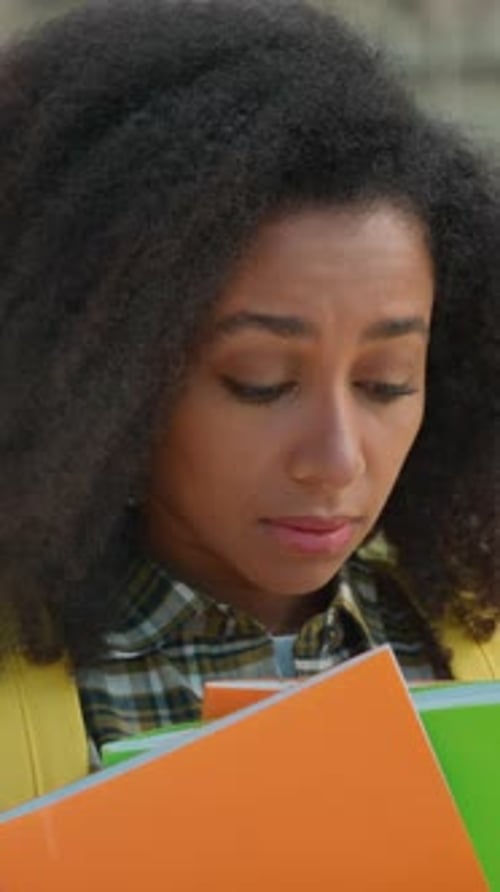 Sad Upset African Woman Student Hold Books Couple Talking Background Bullying Frustrated Girl