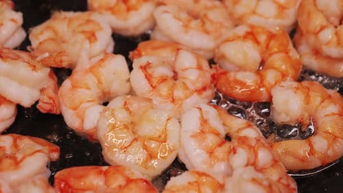 Fresh Big Shrimp Fried in a Pan of Oil Closeup Footage