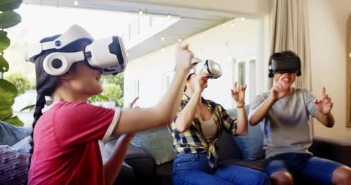 Family Enjoys Virtual Reality in Living Room