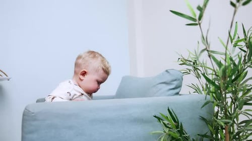 Learning activity with toys. Cute playful baby having fun indoor.