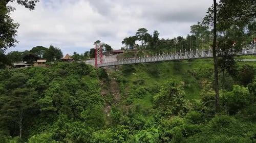 A tourist destination for the Girpasang suspension bridge which has a means of crossing, namely the