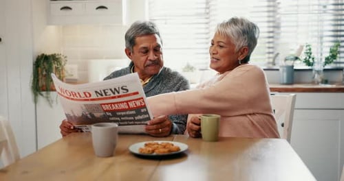 Senior couple, reading and newspaper in home with happy, announcement or press story