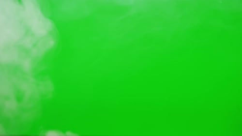 Abstract Smoke on Green Chroma Key Background Smoking Cigarettes or Marijuana Weed Steam Clouds