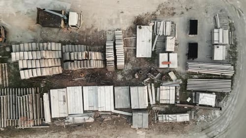 Aerial View of Construction Yard with Building Materials