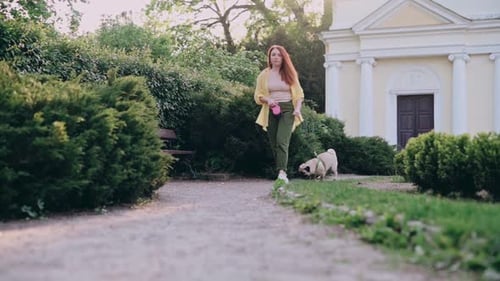 Woman Walking the Dog