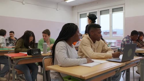 Students working at desks in classroom