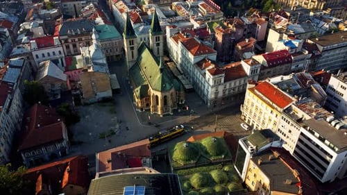 Drone footage of Sarajevo city at sunrise in Bosnia and Herzegovina. Aerial view of the historic