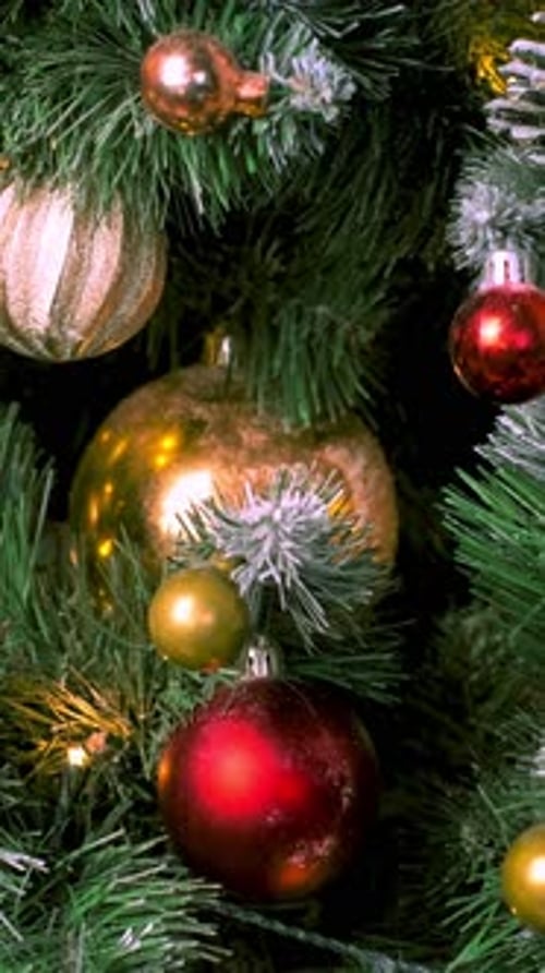 Christmas Tree Decorations and Twinkling Lights at Night